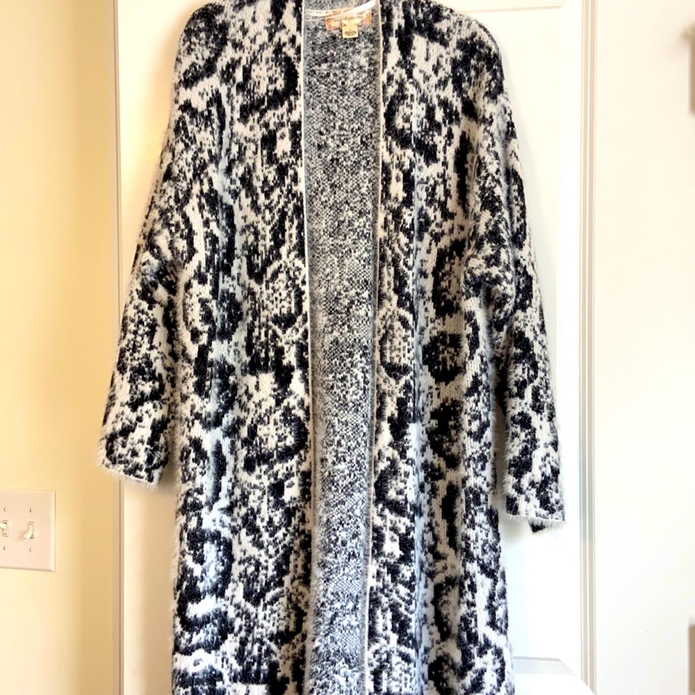 Black & white full length sweater.